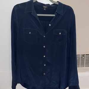 Navy blue Ann Taylor silk blouse. Button up with front pockets. Perf condition
